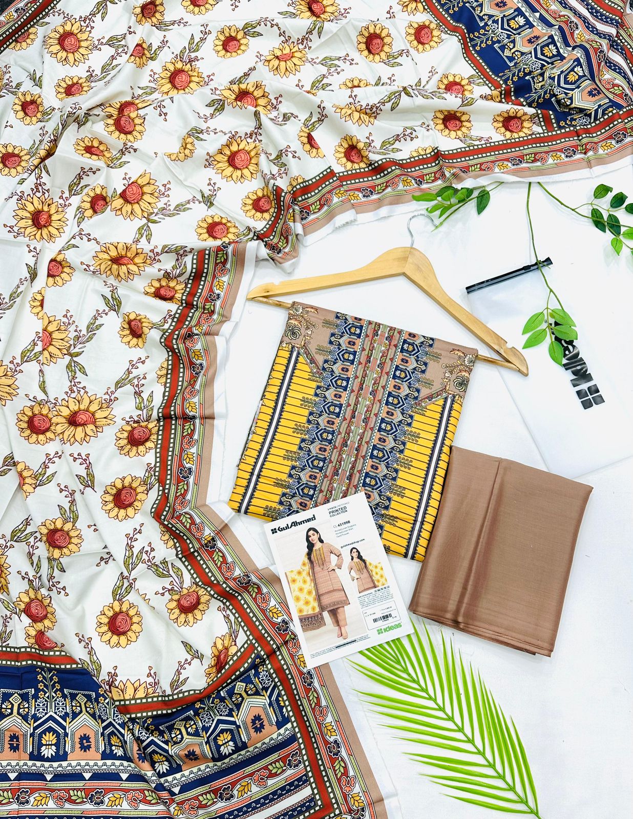 Gul Ahmed linen 3-piece unstitched suit with printed linen shirt, plain trouser and matching printed dupatta.