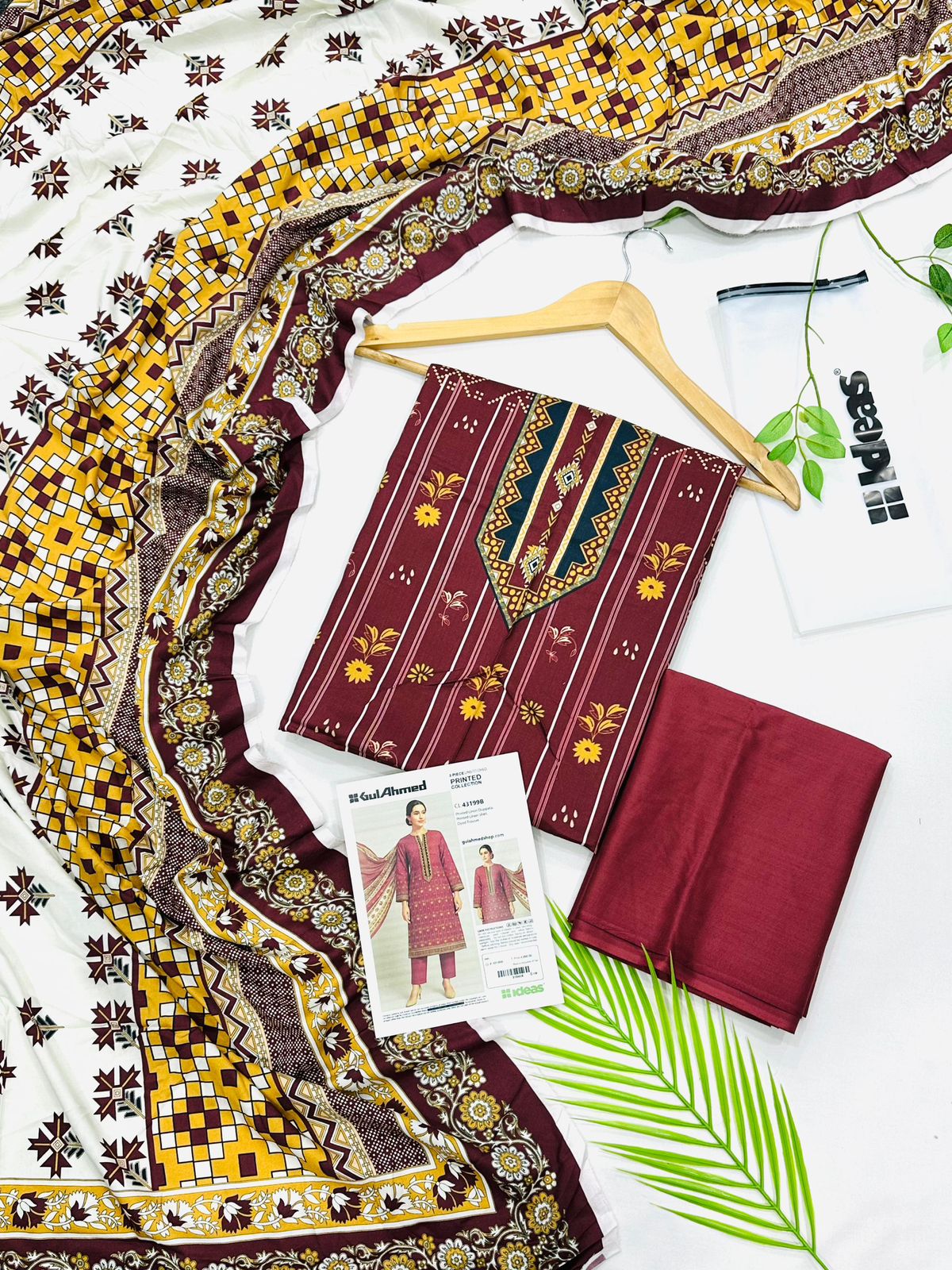 Gul Ahmed linen 3-piece unstitched suit with printed linen shirt, plain trouser and matching printed dupatta.