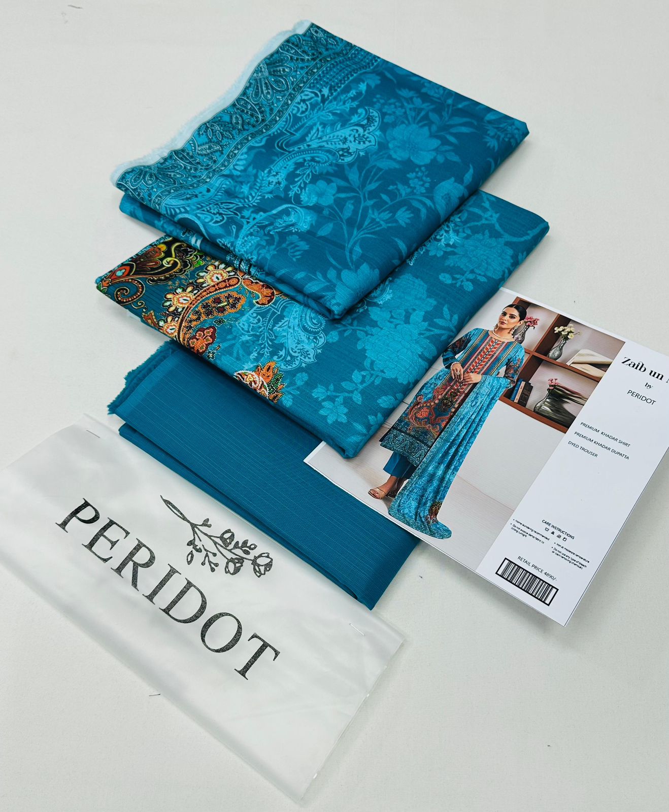 Zaib-un-Nisa by Peridot Khaddar 3-piece unstitched suit with printed khaddar shirt, dyed trouser, and matching dupatta for winter season.