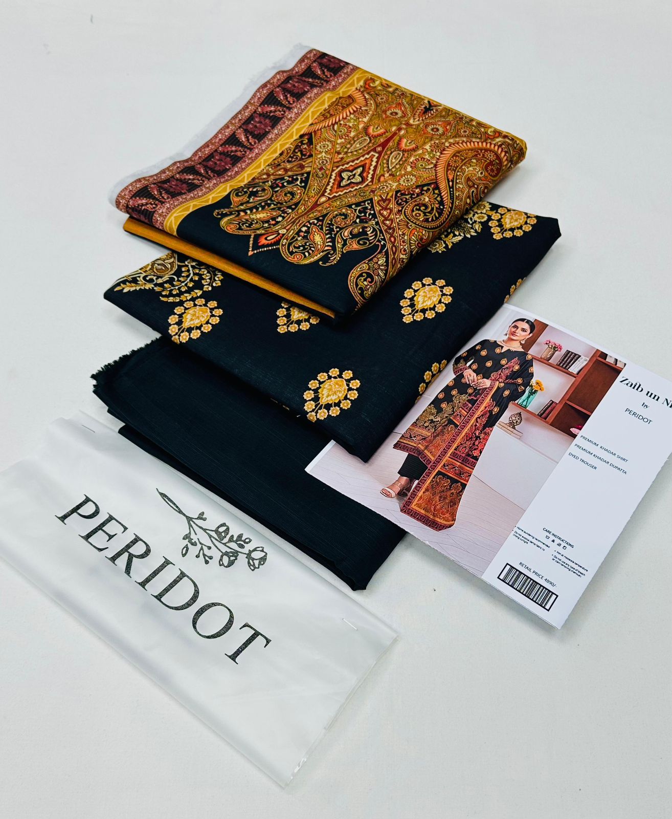 Zaib-un-Nisa by Peridot Khaddar 3-piece unstitched suit with printed khaddar shirt, dyed trouser, and matching dupatta for winter season.
