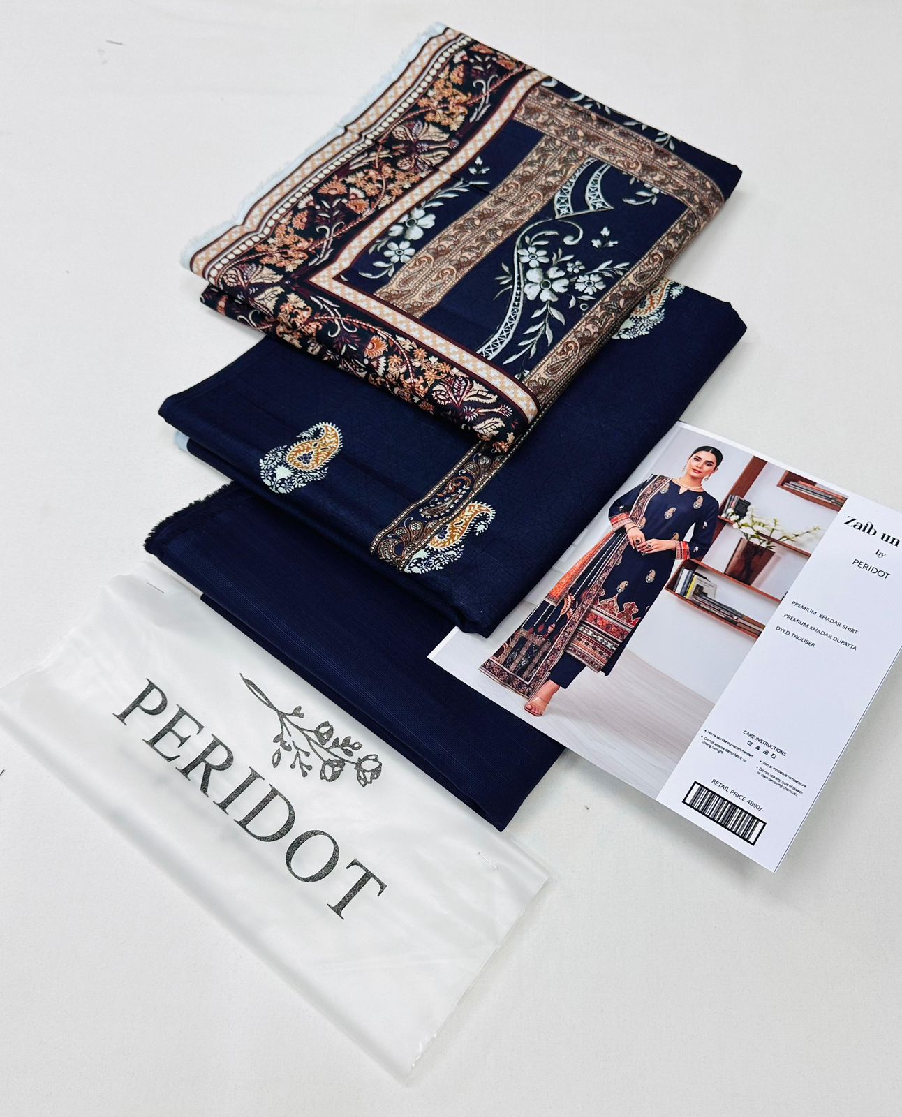 Zaib-un-Nisa by Peridot Khaddar 3-piece unstitched suit with printed khaddar shirt, dyed trouser, and matching dupatta for winter season.