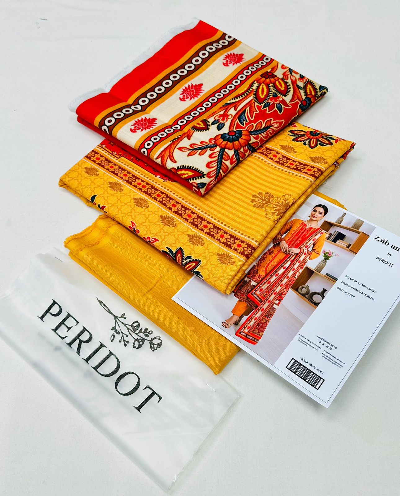 Zaib-un-Nisa by Peridot Khaddar 3-piece unstitched suit with printed khaddar shirt, dyed trouser, and matching dupatta for winter season.