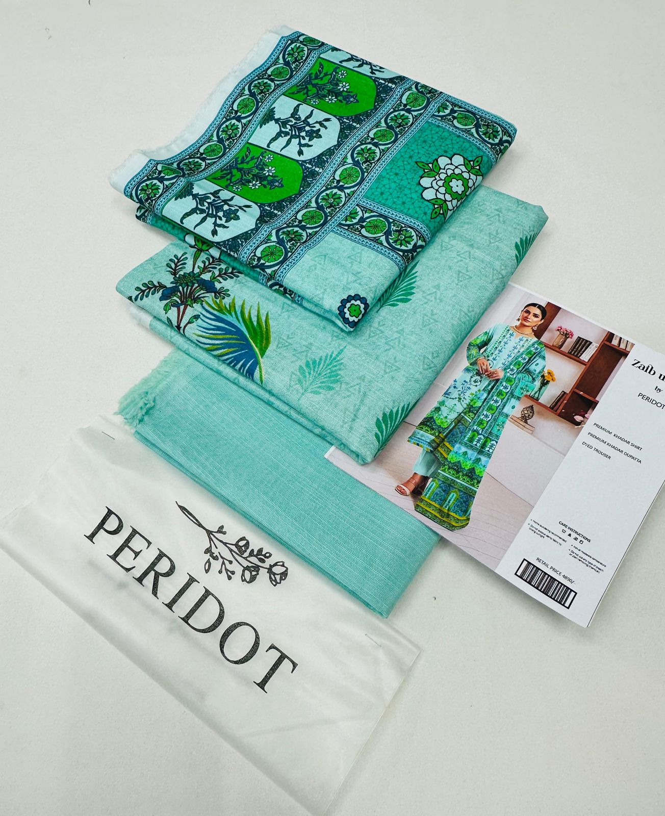 Zaib-un-Nisa by Peridot Khaddar 3-piece unstitched suit with printed khaddar shirt, dyed trouser, and matching dupatta for winter season.