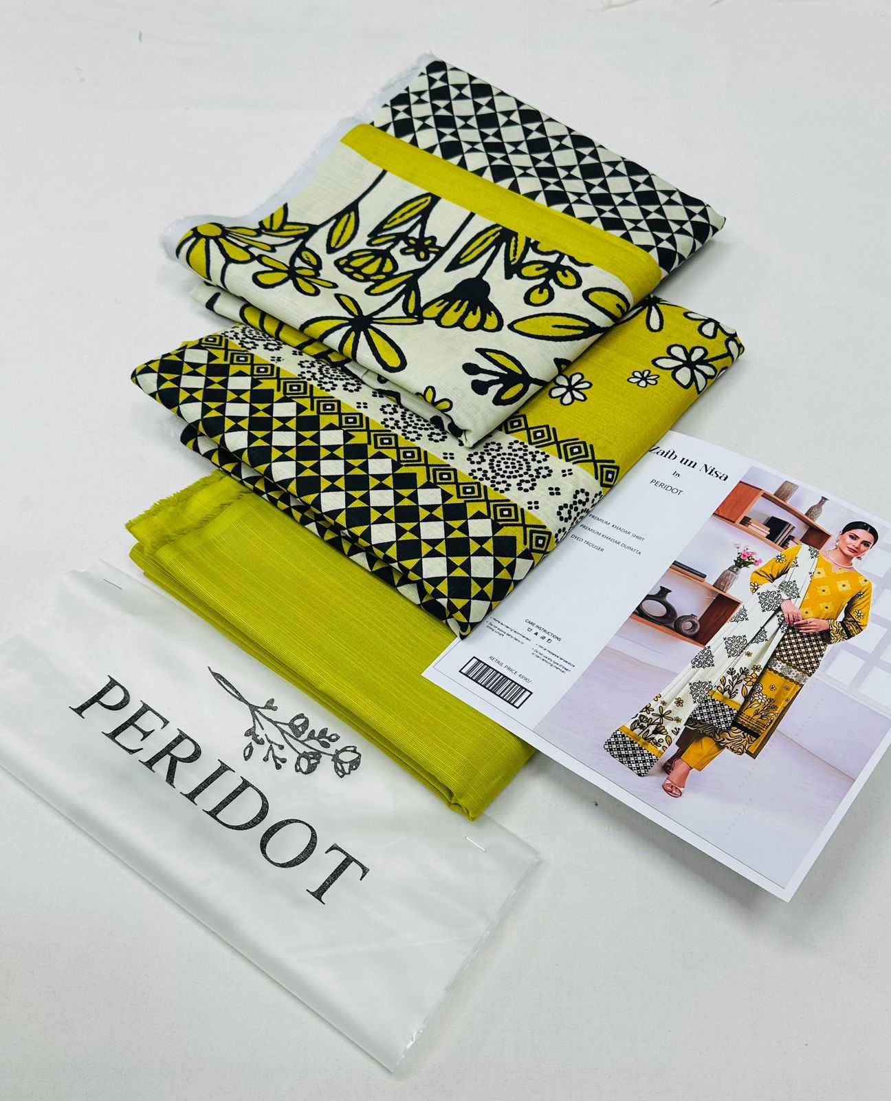 Zaib-un-Nisa by Peridot Khaddar 3-piece unstitched suit with printed khaddar shirt, dyed trouser, and matching dupatta for winter season.