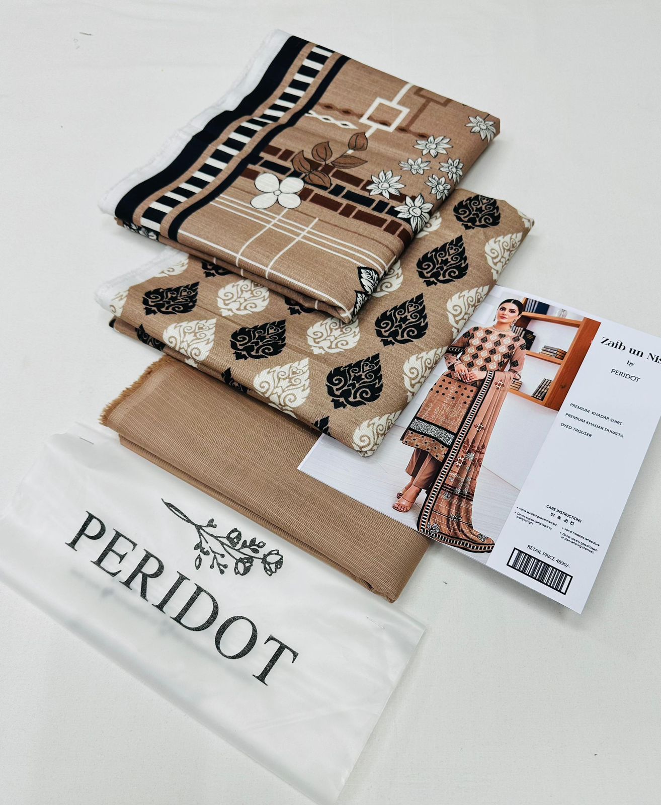 Zaib-un-Nisa by Peridot Khaddar 3-piece unstitched suit with printed khaddar shirt, dyed trouser, and matching dupatta for winter season.